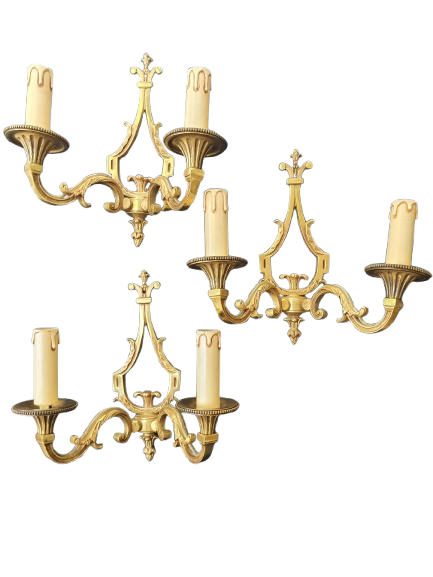 Trois appliques murales en bronze Louis XVI Lucien Gau Paris anciennes