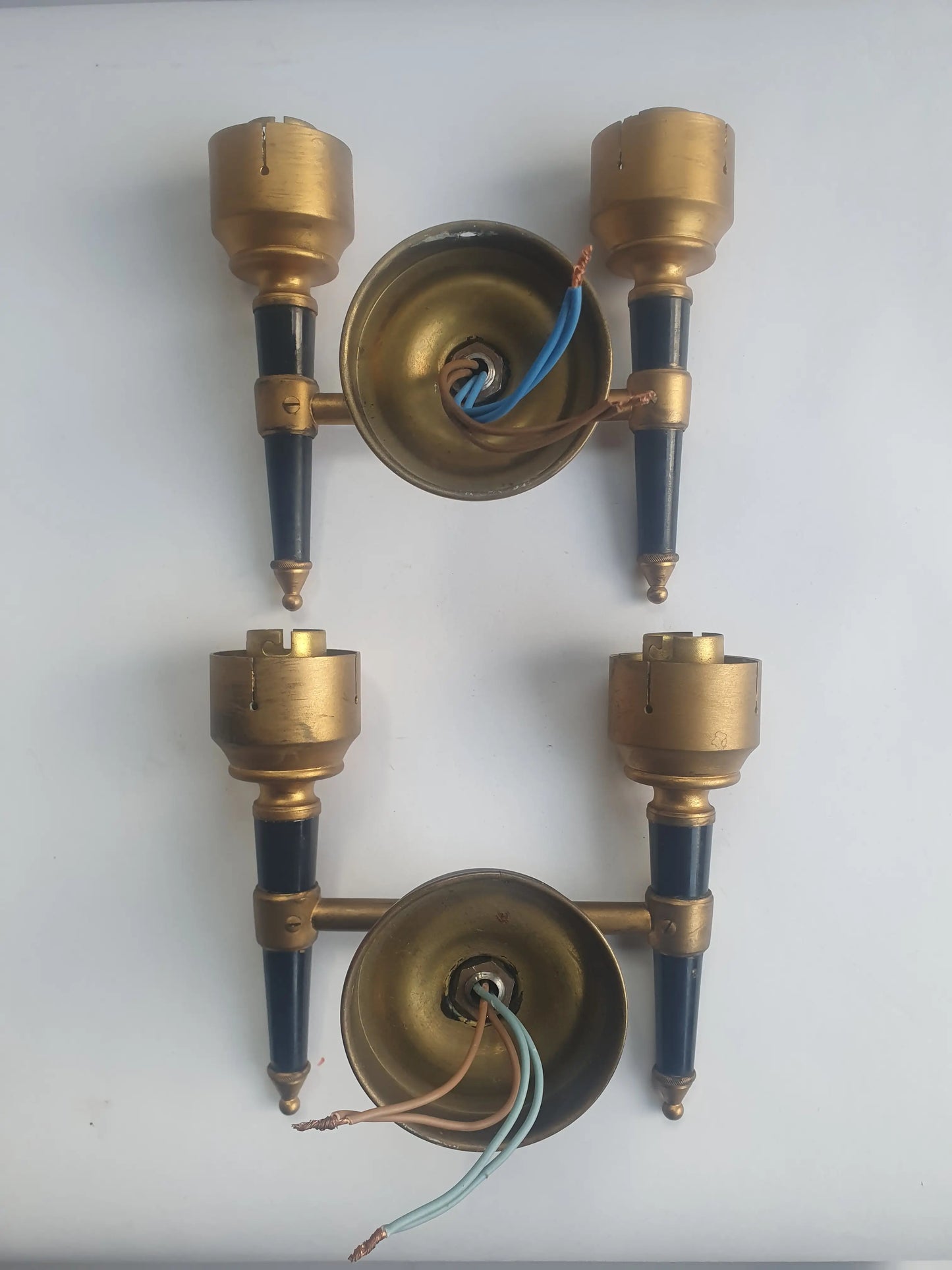 Paire d'appliques murales double lumières dorées flambeau style Empire