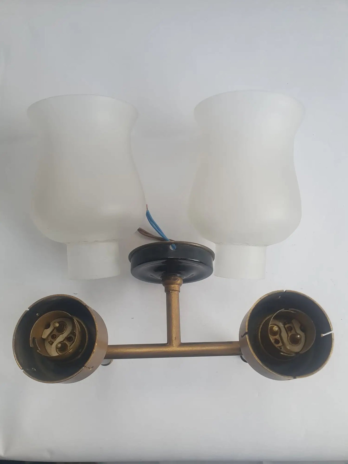 Paire d'appliques murales double lumières dorées flambeau style Empire